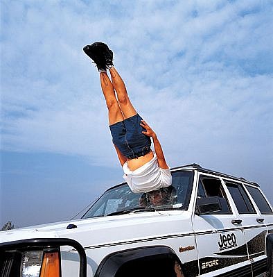 LI WEI, LI WEI FALLS TO THE CAR ED 10
C-print